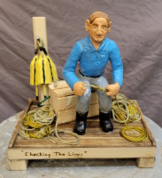 Checking the Lines, wood carving, height 10 inches - sold